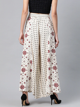 Load image into Gallery viewer, Women Beige & Black Printed Flared Palazzos