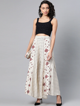 Load image into Gallery viewer, Women Beige & Black Printed Flared Palazzos